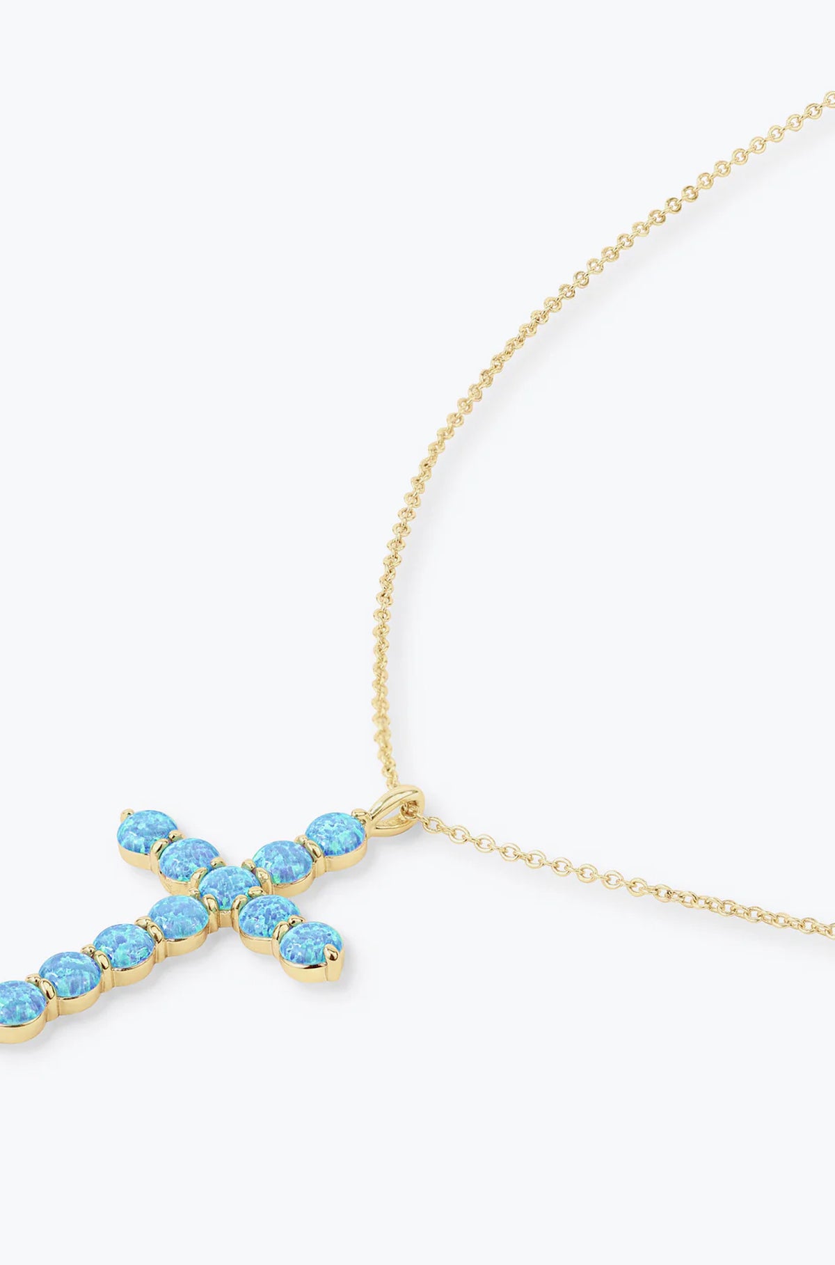 "Oh She Fancy" Cross Pendant Blue Opal 18"