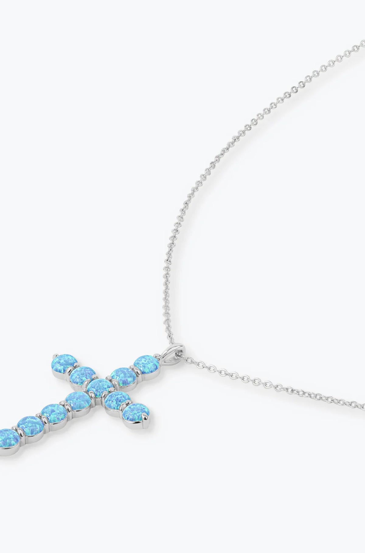 "Oh She Fancy" Cross Pendant Blue Opal 18"